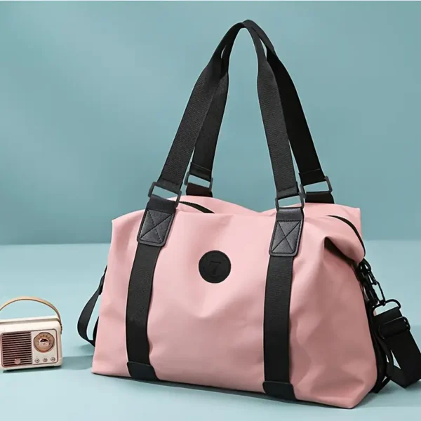 Versatile Pink Nylon Travel Bag with Black Accents - Image 2