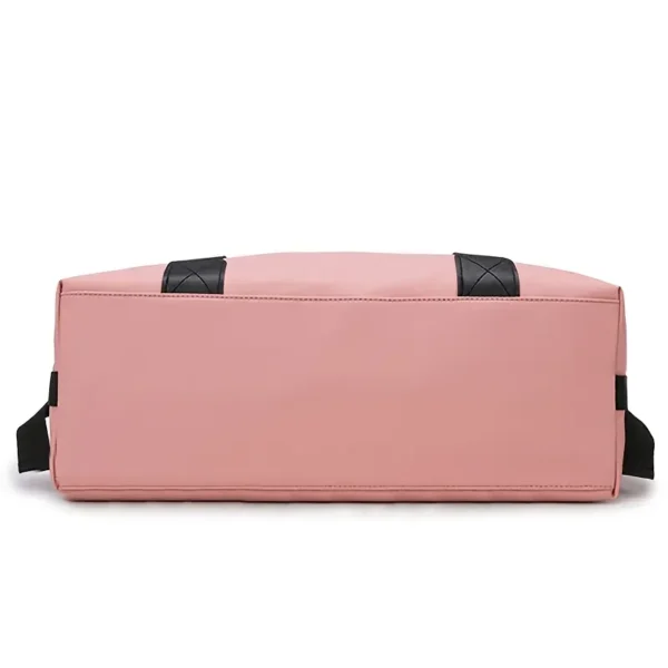 Versatile Pink Nylon Travel Bag with Black Accents - Image 9